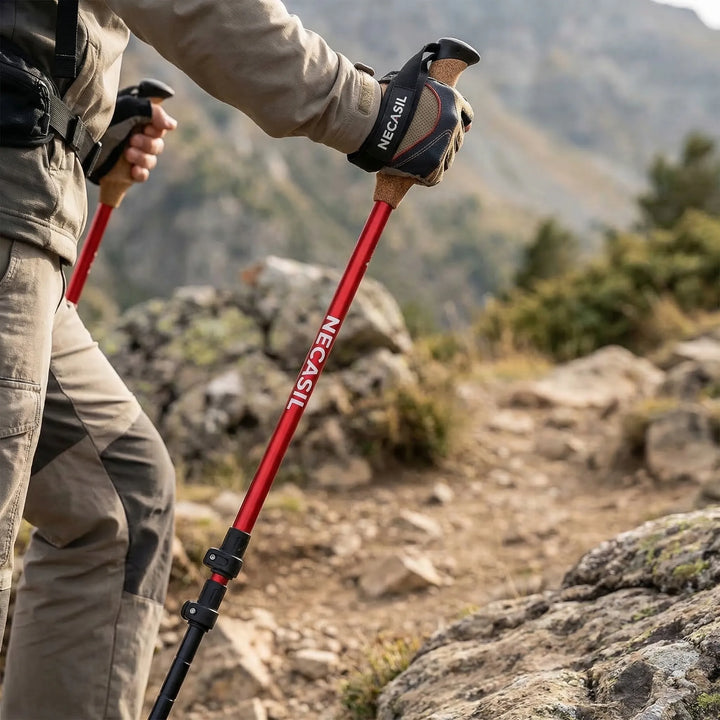 Unisex adjustable telescoping trekking poles for hiking, walking, and trail adventures, enhancing stability.