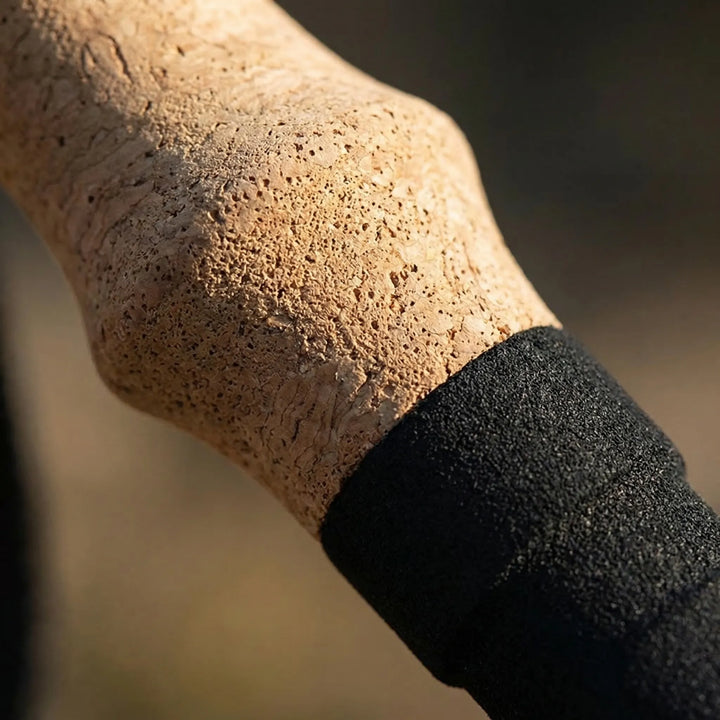 Collapsible trekking poles for easy transport, ultralight and durable for hiking and outdoor trail adventures.