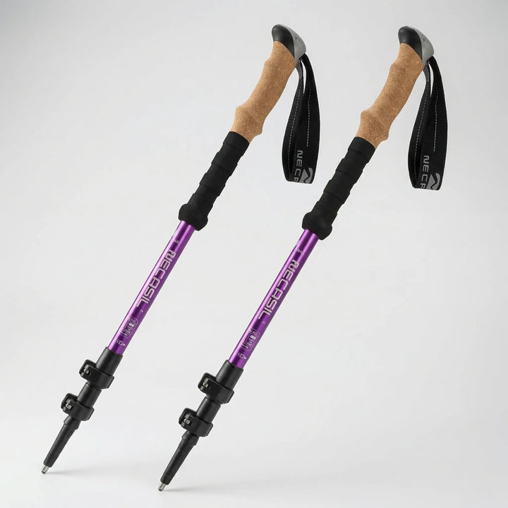 Durable aluminum adjustable hiking poles with ergonomic grips for comfortable trekking and walking long distances.