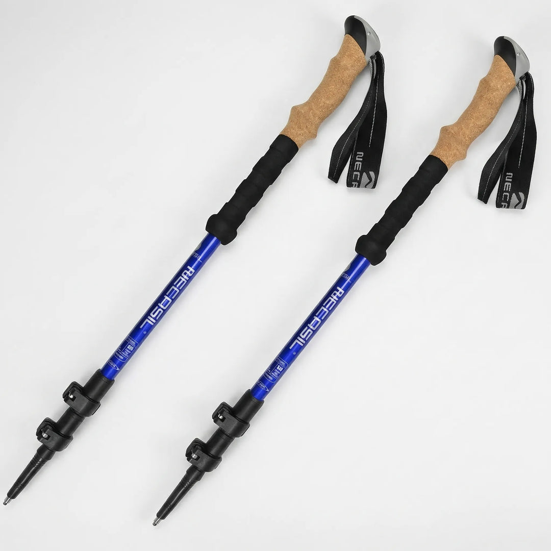 Compact, collapsed ultralight trekking poles, ready for packing in a hiking backpack for adventure travel.