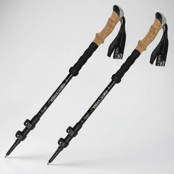 Pair of unisex ultralight telescoping trekking poles, essential adjustable gear for outdoor hiking and trails.