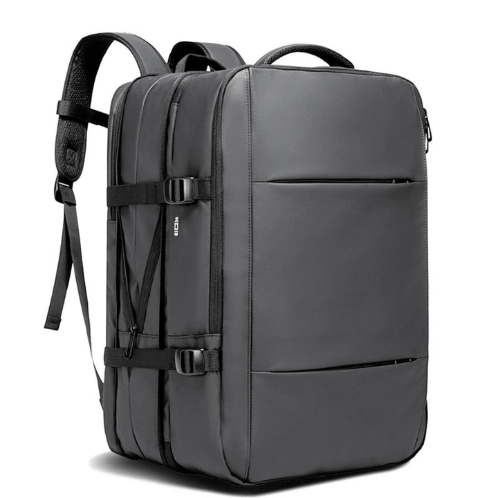 Expandable travel backpack, water resistant with USB charging port for organized trips.