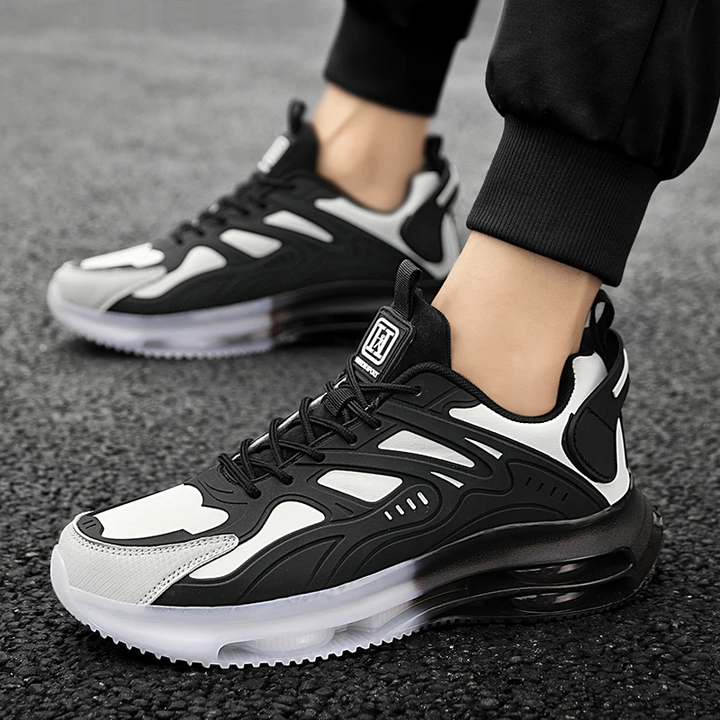 Athlete wearing AirTech performance running sneakers. Cushioned & sporty, providing enhanced comfort & support.