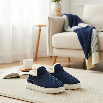 Detail of the anti-slip sole on plush home slippers, ensuring safety on various surfaces