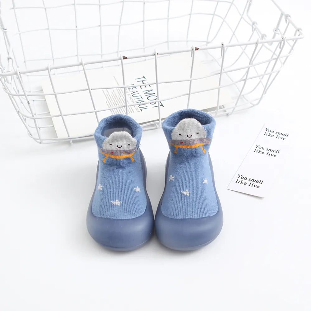 Multicolor pack of anti-slip baby socks, each with a secure rubber sole for active toddlers.