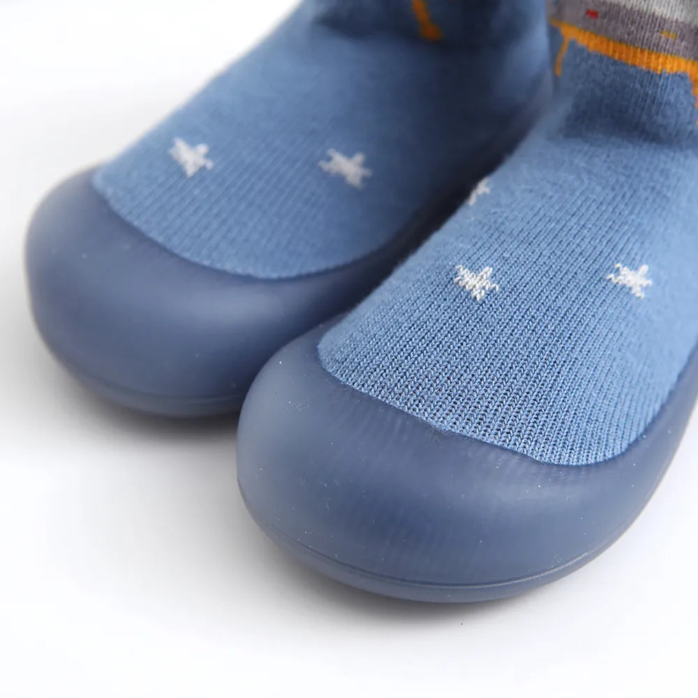 Bright blue anti-slip baby socks, comfortable cotton with an integrated rubber sole floor grip.