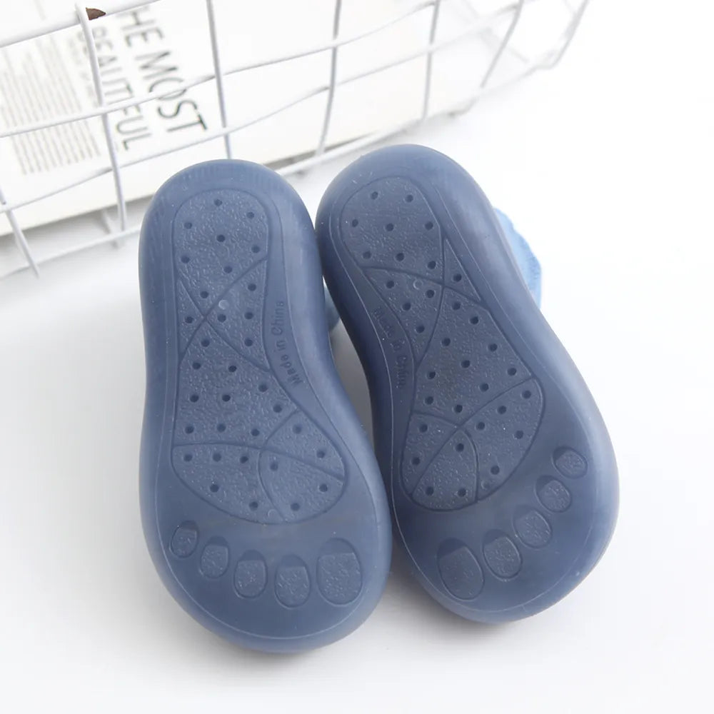 Patterned anti-slip toddler socks, cotton with a durable rubber sole, first walker appropriate.