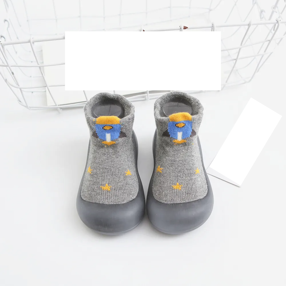 Durable anti-slip toddler socks, reinforced rubber sole for active play, unisex design.