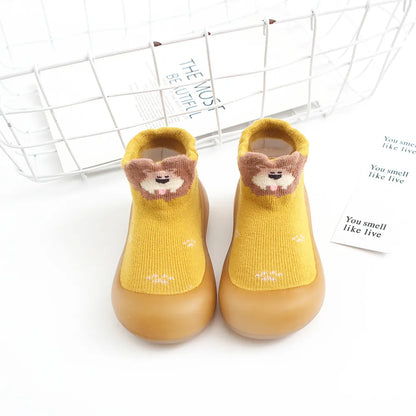 Green anti-slip toddler socks, cotton blend with sturdy rubber sole for indoor play.