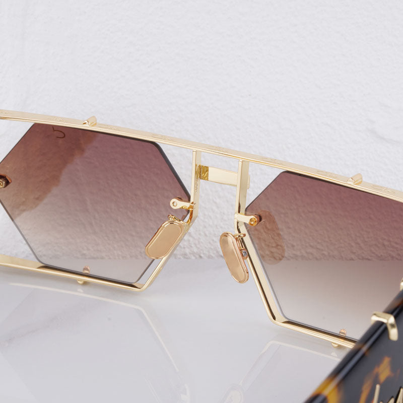 Summer essential: Arden Hexagon unisex sunglasses. Alloy frame, UV400 protection for beach or city style.