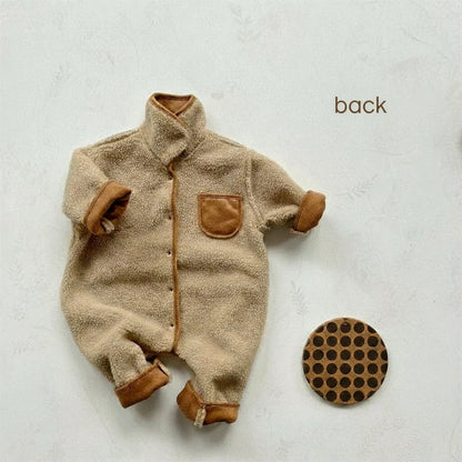 Full shot of a unisex baby winter romper, hooded design, thick and cozy, for cold weather