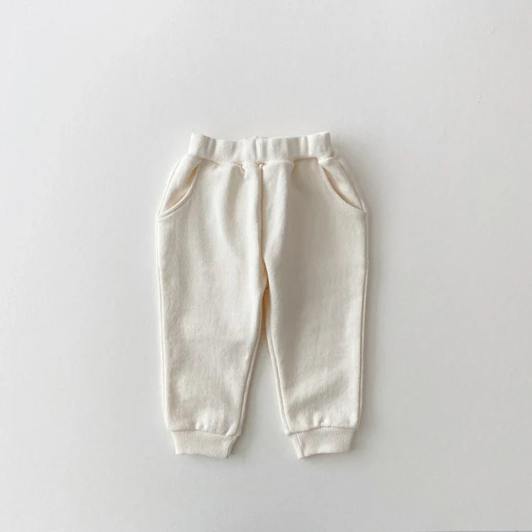 Unisex infant hoodie and pants set, made from breathable cotton, featuring a cute bear icon.