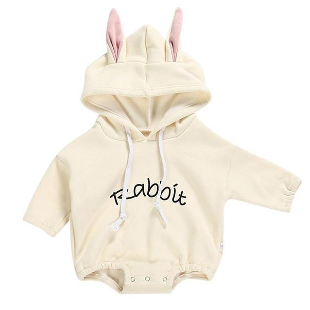 Infant hooded bunny romper, white plush fabric, great for newborn clothing and cozy winter baby wear.