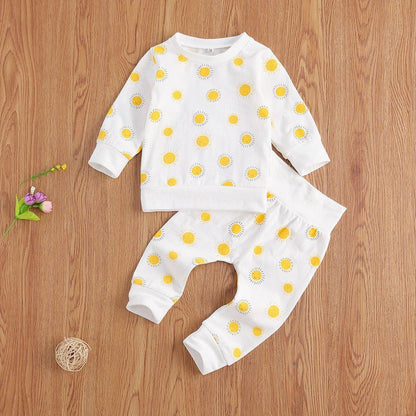 Unisex baby 2-piece pajama set with sunny yellow sun print, soft cotton sleepwear for infants