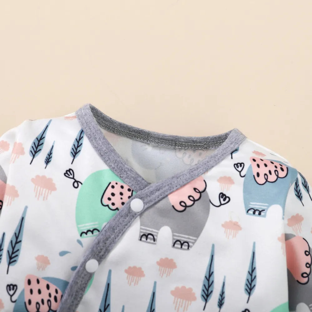 Adorable infant unisex animal print romper with footies, ensuring baby's comfort.