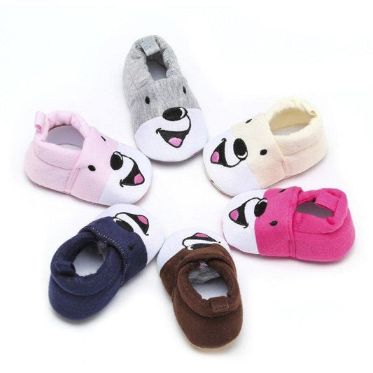 Unisex baby anti-slip cotton shoes in bear cub design, perfect for first walkers.