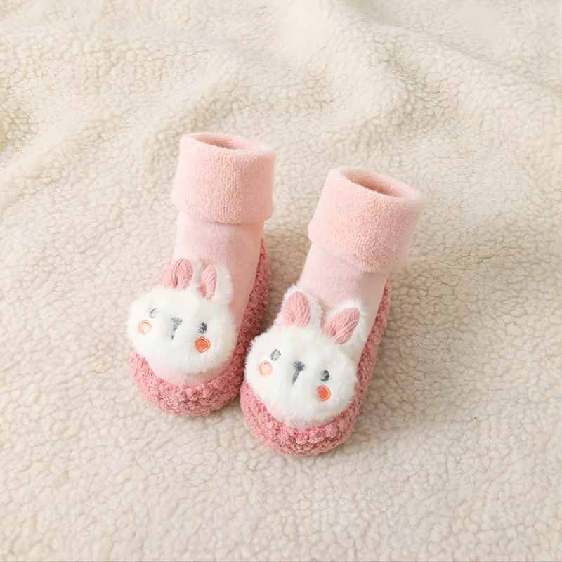 Breathable knit baby sock shoes with a comfortable soft sole and non-slip bottom, in a charming bunny style.