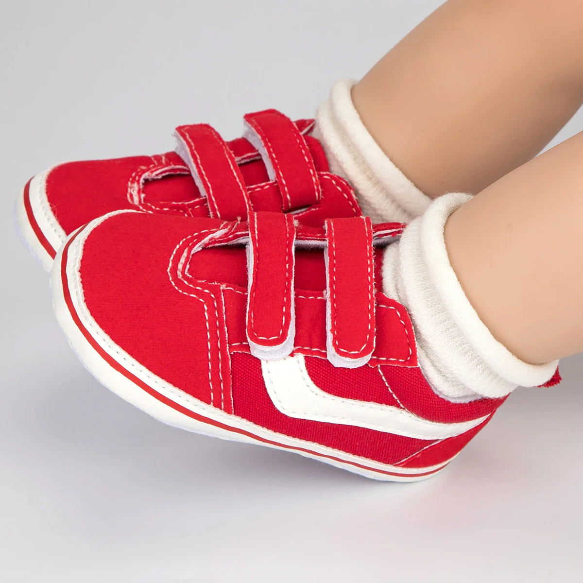 Durable toddler first walkers, unisex canvas design with soft sole for active little ones.