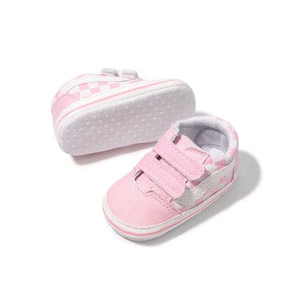 Flexible soft sole canvas baby shoes, unisex first walkers for secure and natural movement.