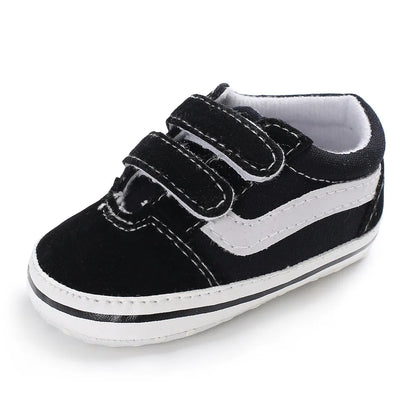 Toddler shoes: durable canvas first walkers with soft sole for active baby exploration.