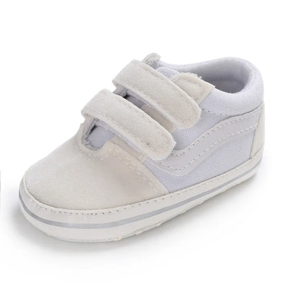 Unisex canvas baby shoes, soft sole infant sneakers, perfect for baby's first walking adventures.