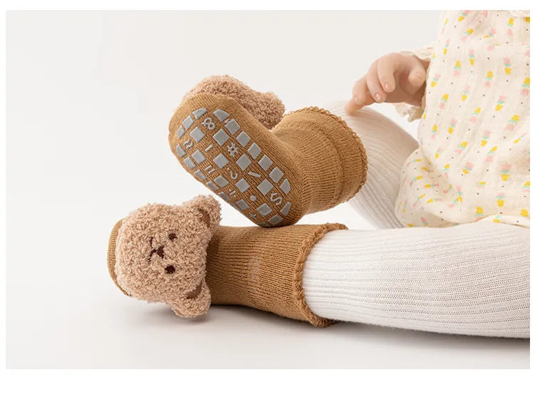 Unisex anti-slip winter socks for infants, soft cotton with happy cartoon bear