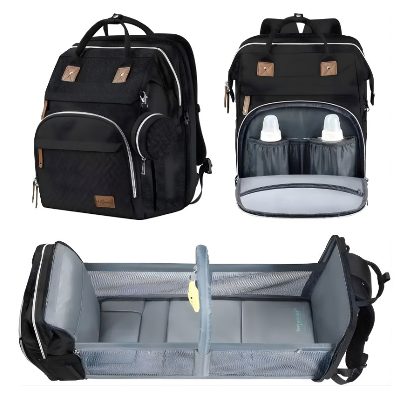Unisex waterproof baby changing backpack in navy blue, unzipped to reveal wipes dispenser & pacifier case