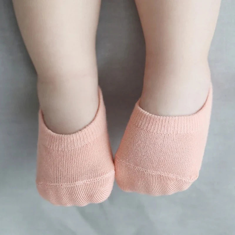 Infant anti-slip floor socks with cartoon animal patterns, keeping tiny feet warm & safe