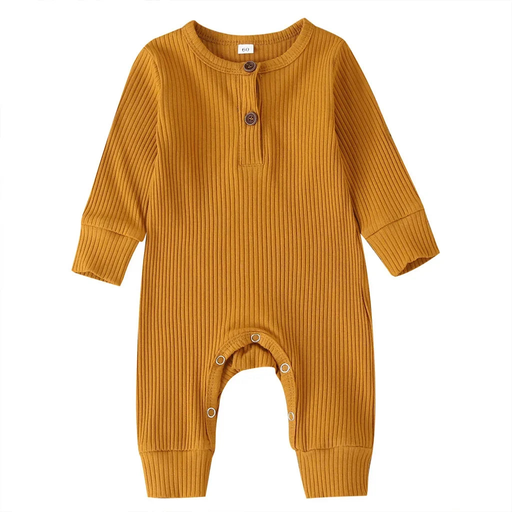 Stylish long sleeve cotton baby romper, unisex design, an essential piece for autumn baby fashion.