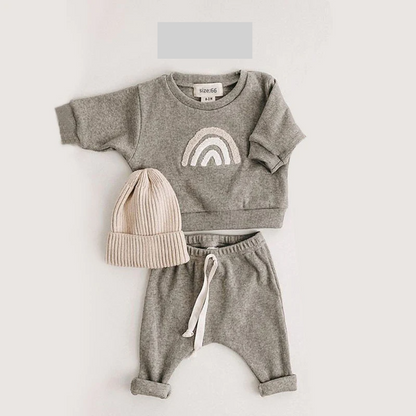 Unisex baby cotton ribbed outfit with elastic waistband, providing comfortable fit for toddlers and infants