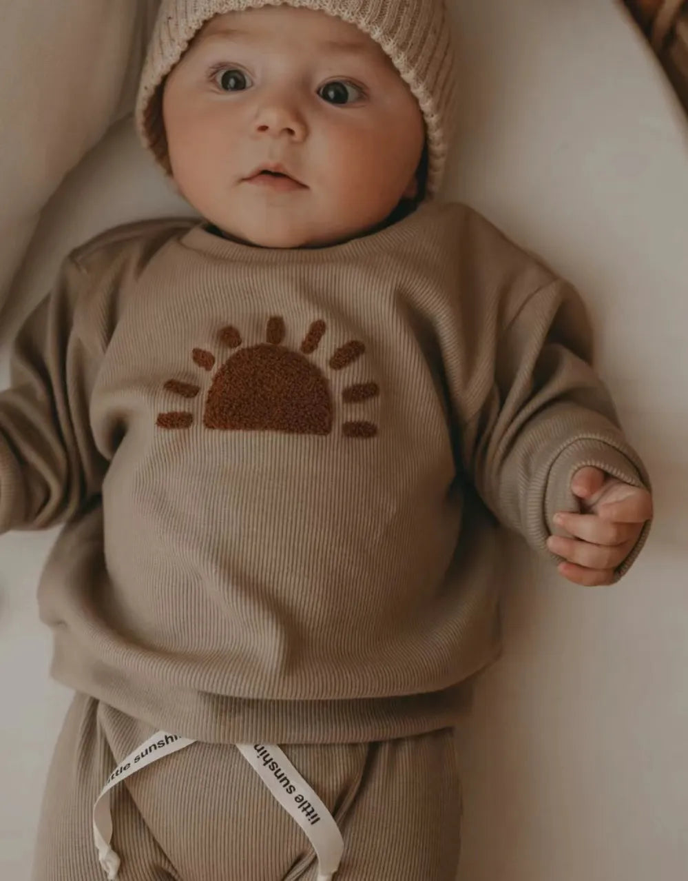 Unisex baby cotton ribbed long-sleeve top, a versatile piece of infant apparel in a cozy, soft fabric