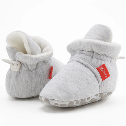 Unisex baby cotton soft sole first walker sock shoes, essential for first steps.