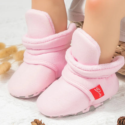 Unisex baby cotton soft sole first walker sock shoes in a variety of colors displayed.
