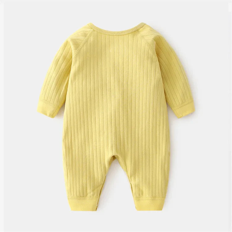 Close-up of romper neckline, displaying comfortable and safe design for baby's neck