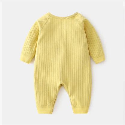 Close-up of romper neckline, displaying comfortable and safe design for baby's neck