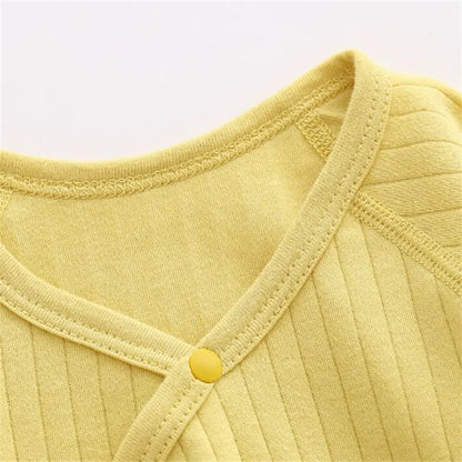 Unisex infant jumpsuit in a neutral color, versatile soft baby wear for any baby