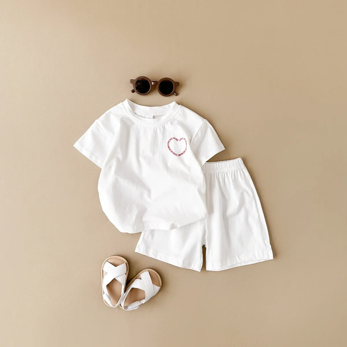 Close-up of soft cotton t-shirt & shorts set for baby summer fashion, unisex design