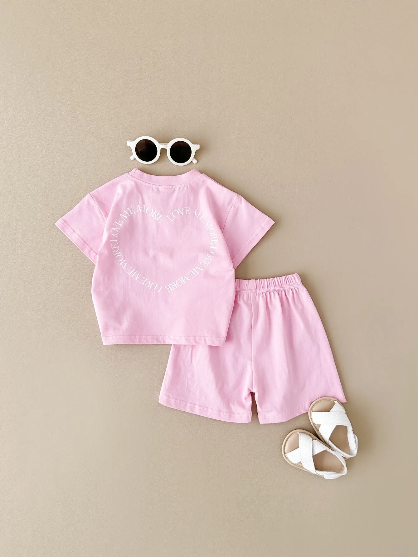 Infant apparel gift set featuring a breathable cotton t-shirt & shorts for summer