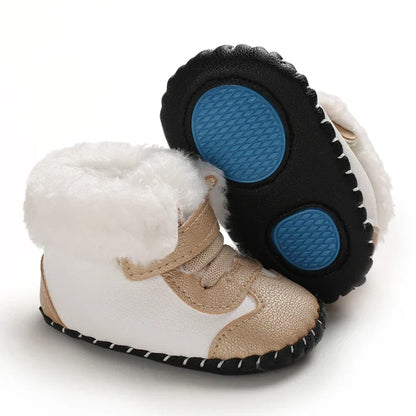 Close-up of cozy baby winter boots, adjustable strap detail, non-slip design, infant apparel