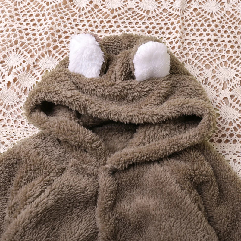 Warm winter romper for baby, featuring playful cartoon embroidery and a hood