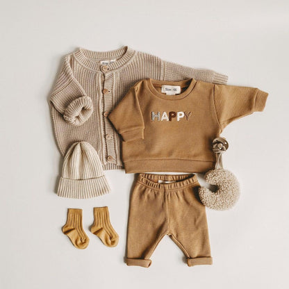 Baby clothes: Rust colored top and coordinating bottoms, a stylish kids fall outfit.