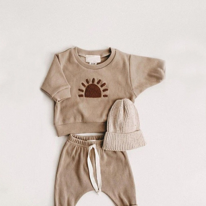 Essential baby top and pants set in a warm earth tone for autumn baby fashion.