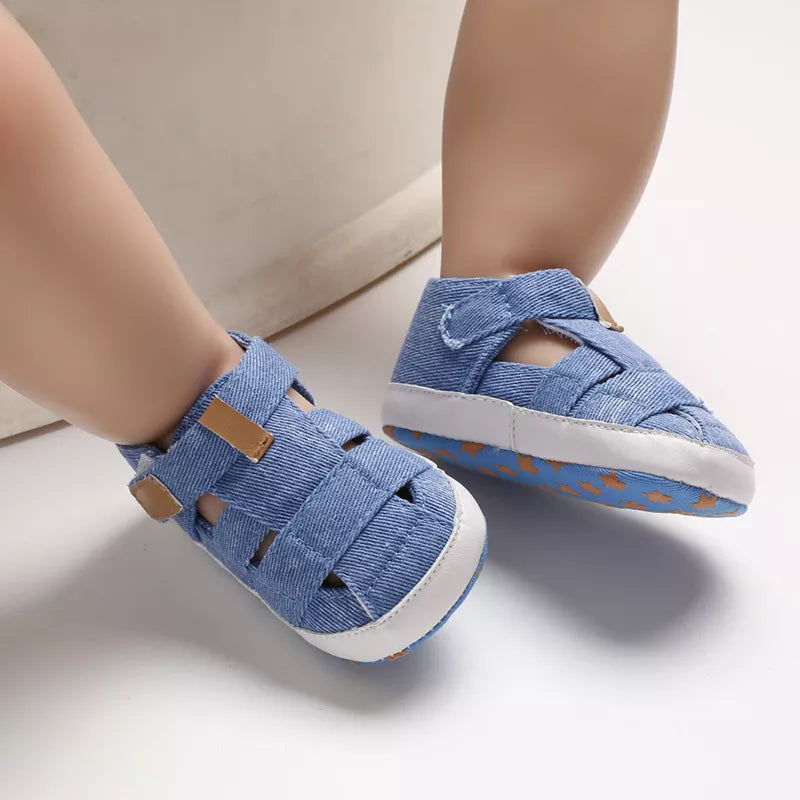Unisex baby first walker canvas shoes, soft sole, anti-slip, hook & loop closure in navy blue.