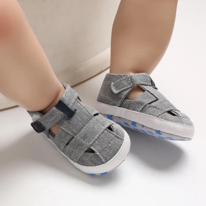 Grey baby canvas first walkers, unisex design, soft sole for indoor and outdoor play.