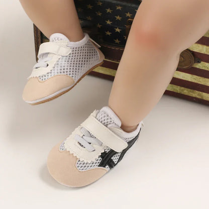 Unisex baby first walker shoes, anti-slip soft sole for infants and toddlers.