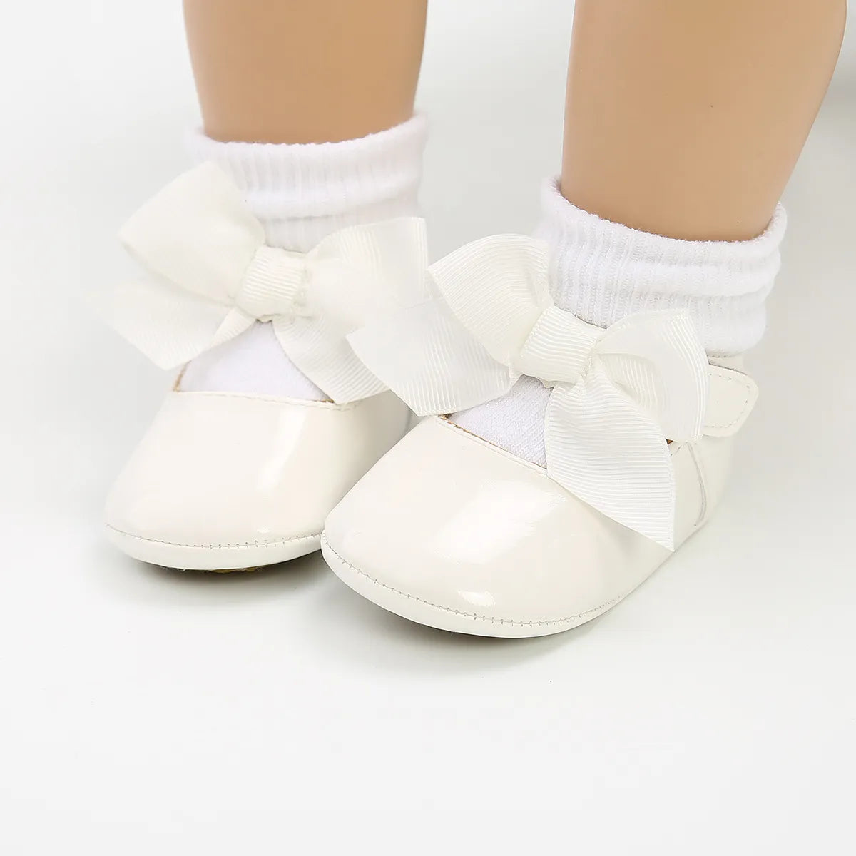 Comfortable and safe white anti-slip baby first walker shoes, unisex design, soft sole for infant development