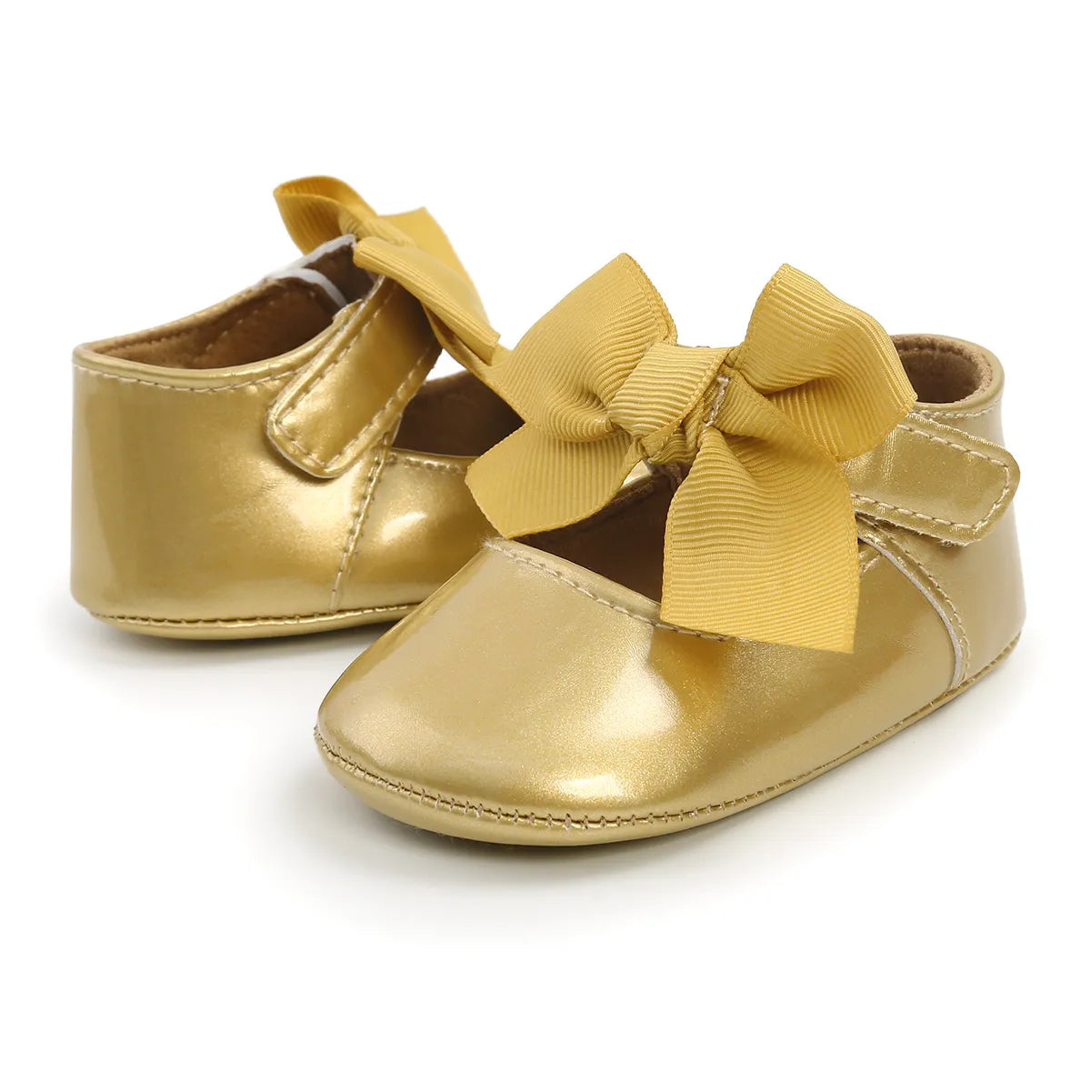 Unisex baby first walker shoes in white PU leather, features anti-slip soft sole for secure steps, casual style