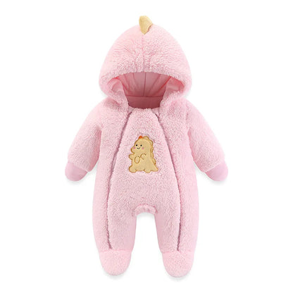 Toddler modeling a cozy unisex hooded romper with fun cartoon patterns