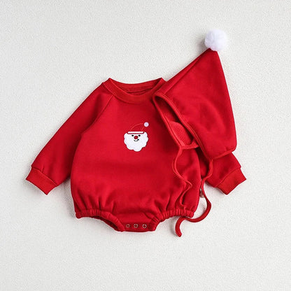 Outfit flat lay: Unisex baby Santa romper and hat, essential Christmas apparel for infants.