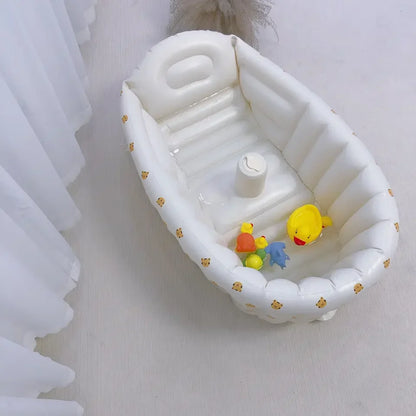 Close-up of the textured non-slip bottom of a unisex inflatable baby bathtub for infant safety